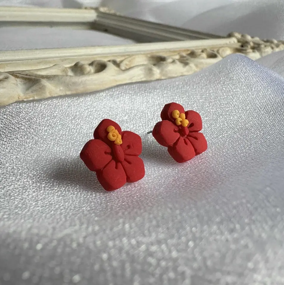 Hibiscos · Rojos Caravanas