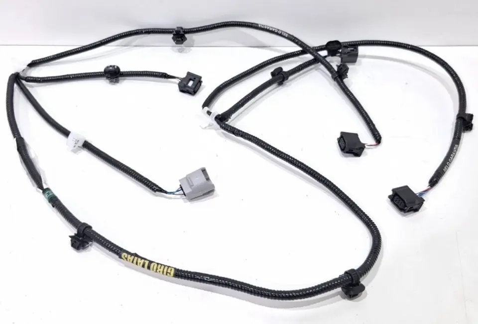 chicote paragolpe trasero hilux 2021/2025 original