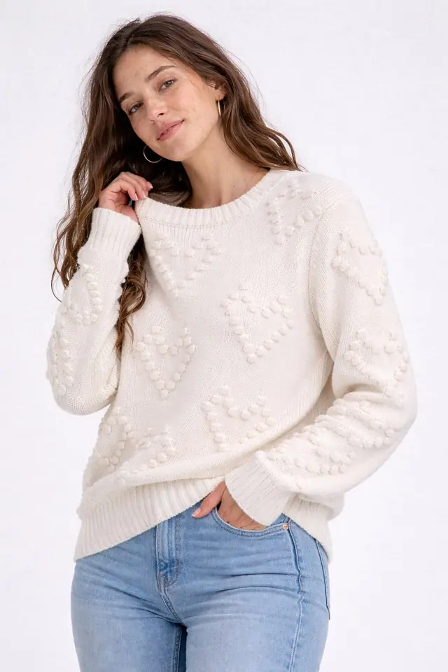 Sweater tejido corazones