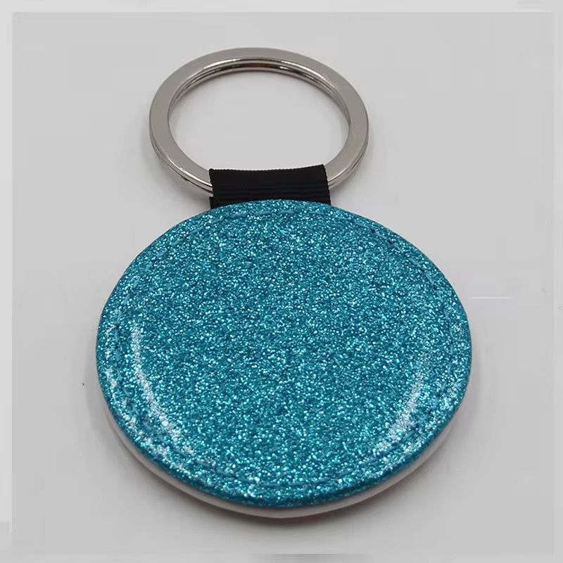LLAVERO PU GLITTER CIRCULAR AZUL