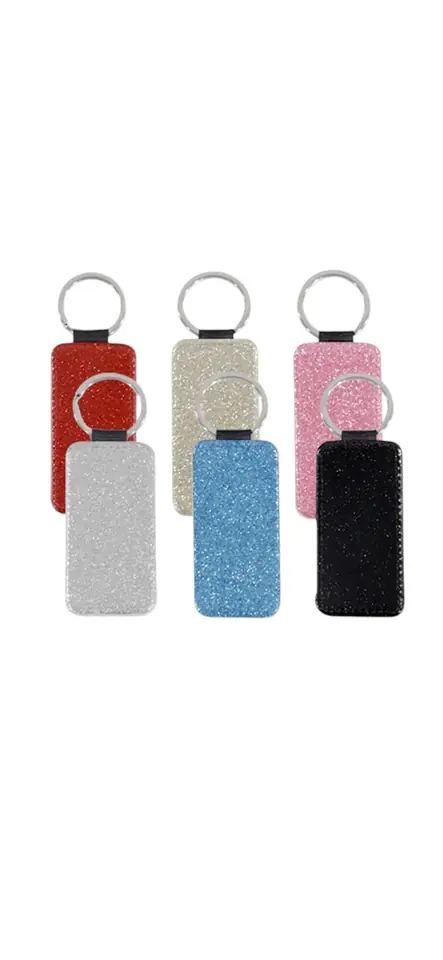 LLAVERO PU CON GLITTER PLATA
