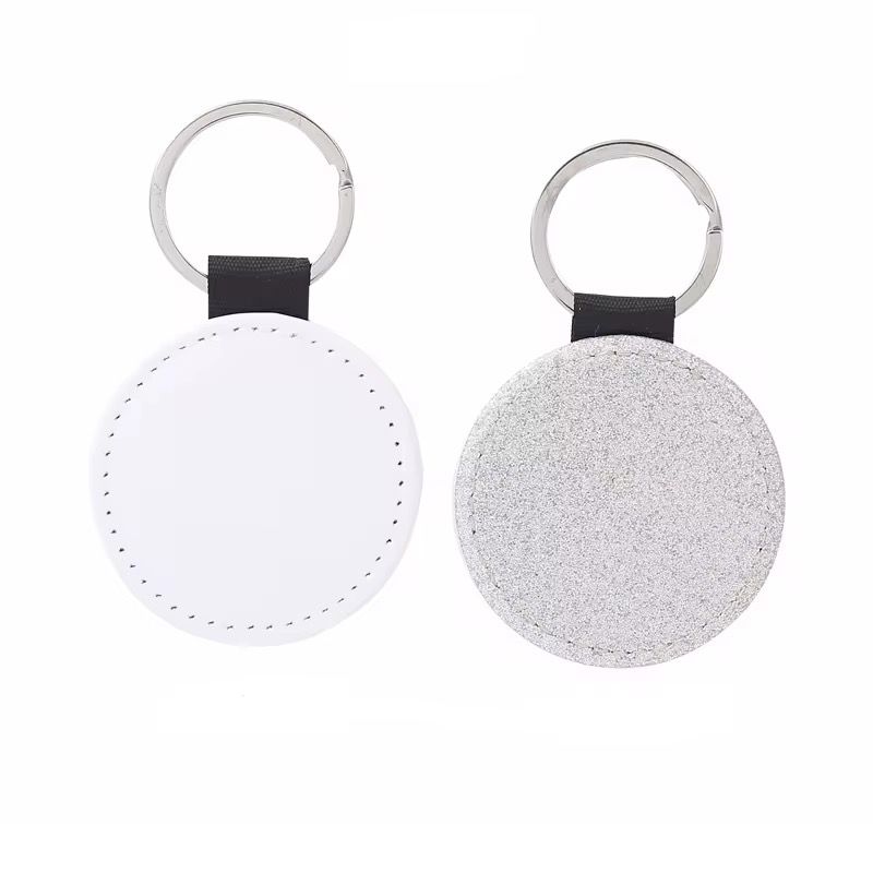 LLAVERO PU GLITTER CIRCULAR PLATEADO