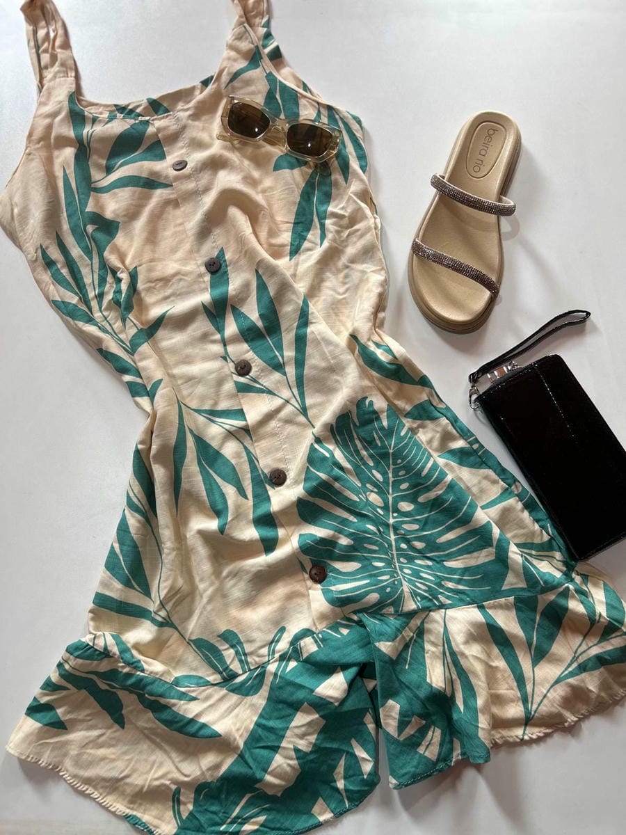 Vestido beige con hojas verdes