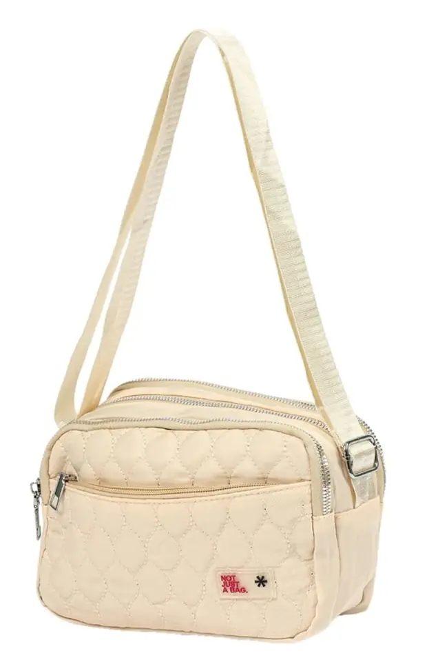 Bandolera beige capitoneada