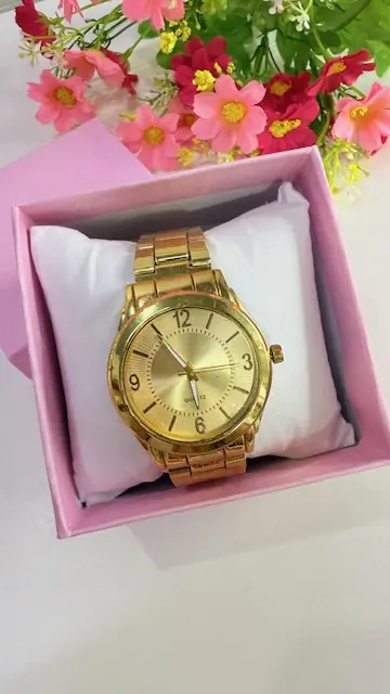 Reloj dorado dama