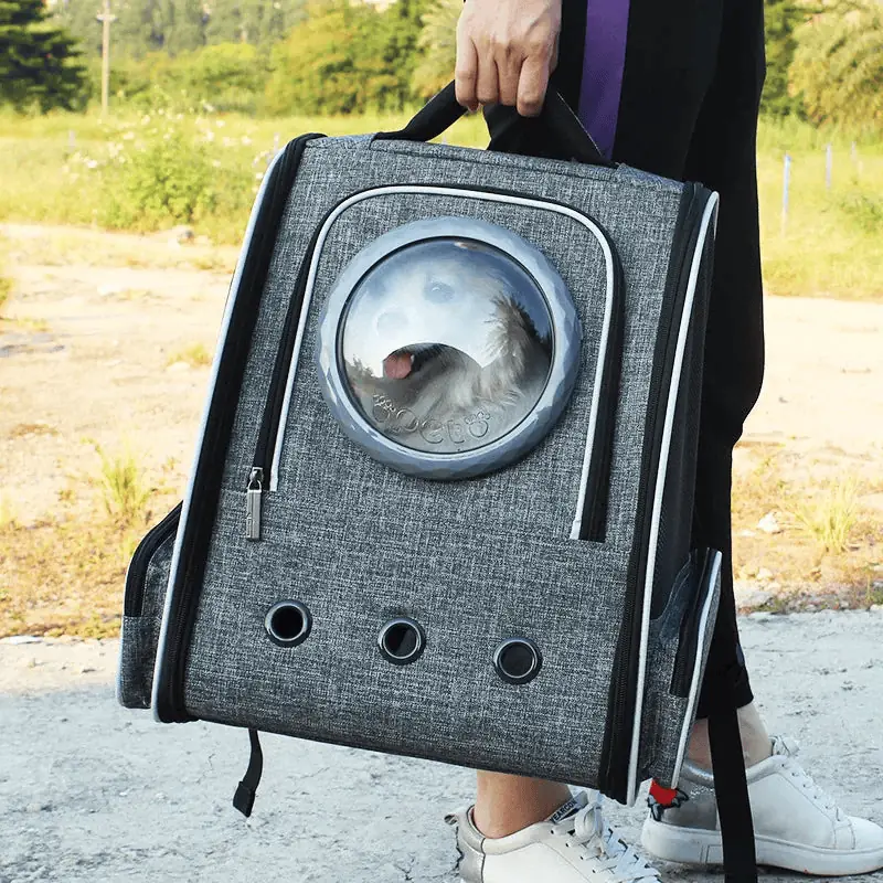Mochila transportadora. Burbuja y rejilla intercambiable. 31x28,2x41cm. (Varios colores)