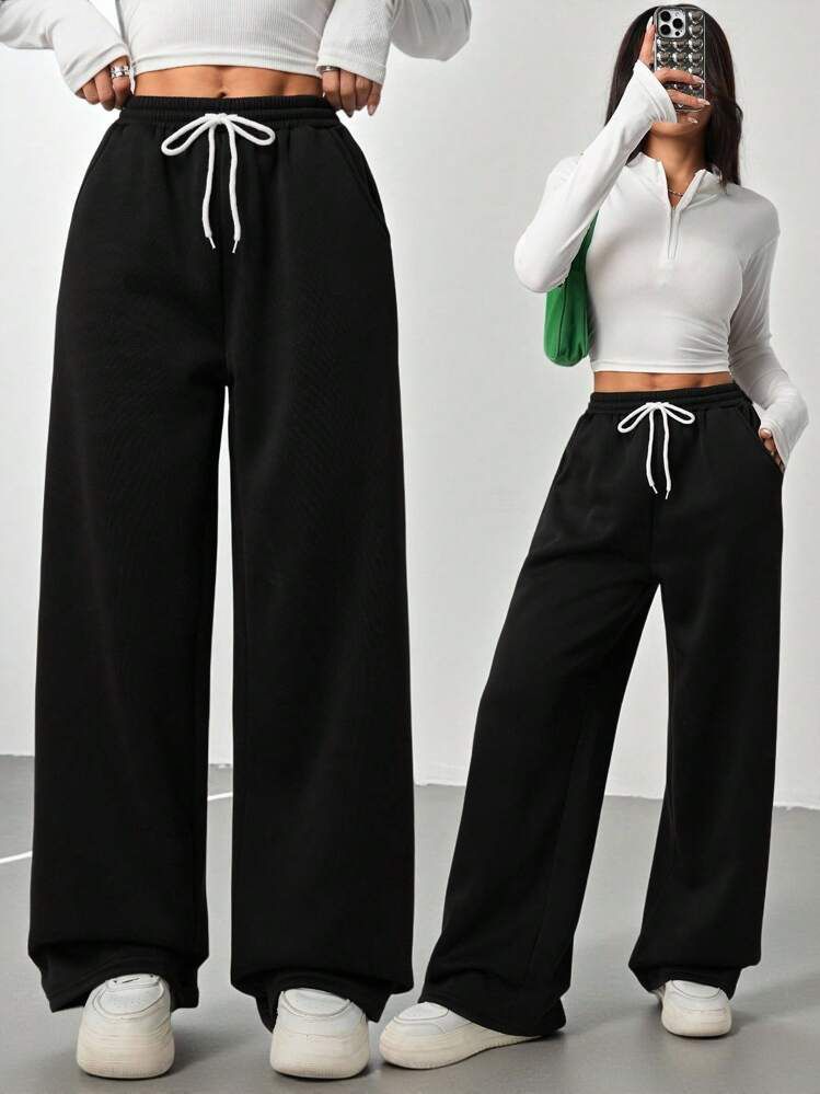 Pantalón negro ancho sin felpa cordon blanco