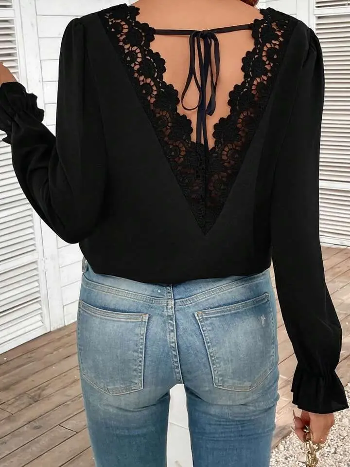 Blusa negra espalda con encaje manga larga