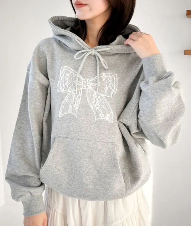 Canguro gris moño de encaje blanco