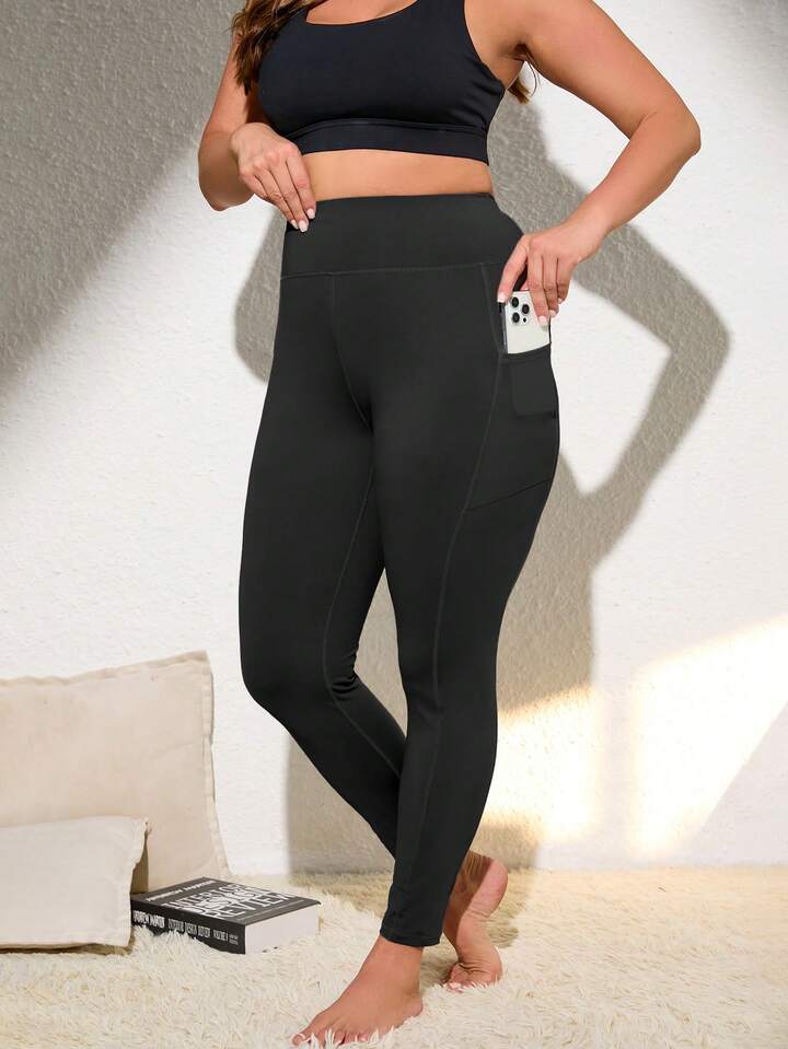 Calza deportiva negra con bolsillo