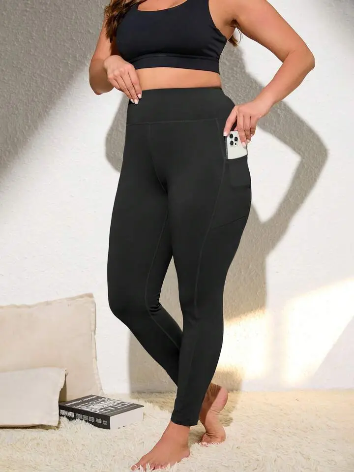 Calza deportiva negra con bolsillo