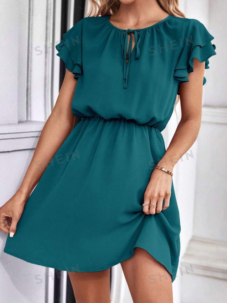 Vestido verde oscuro corto con elastico