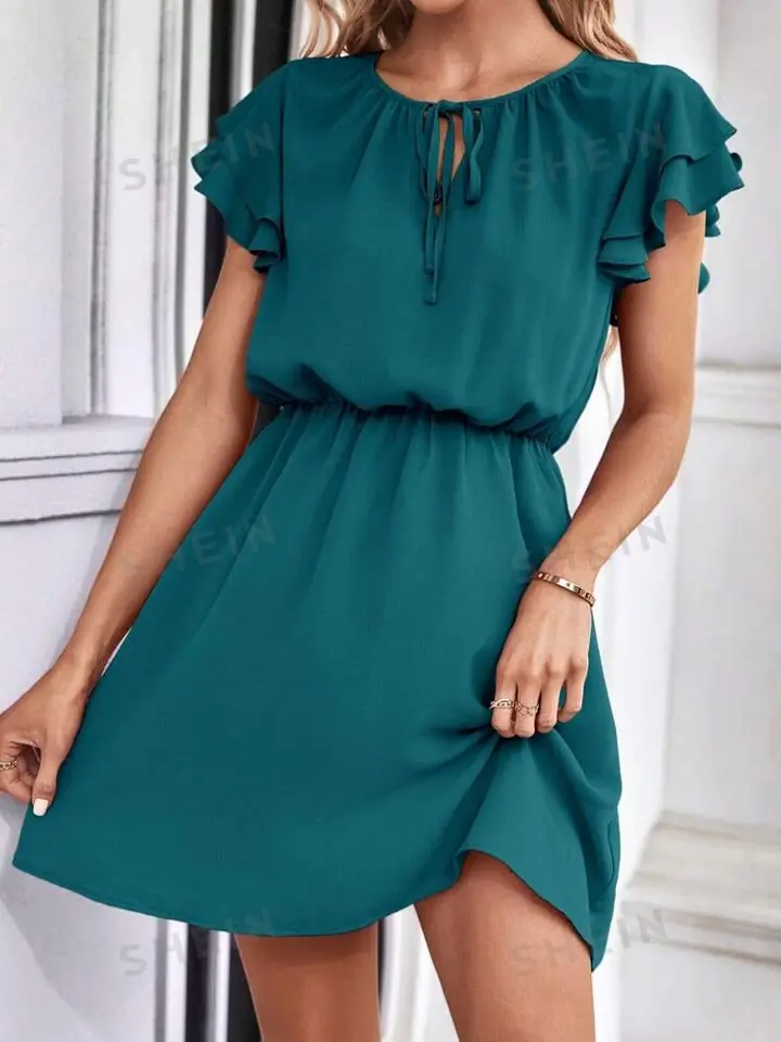Vestido verde oscuro corto con elastico
