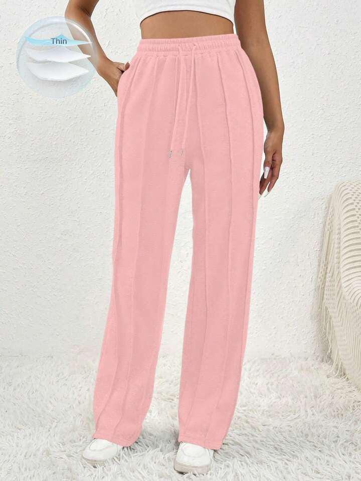 Pantalón rosa claro lineas para afuera