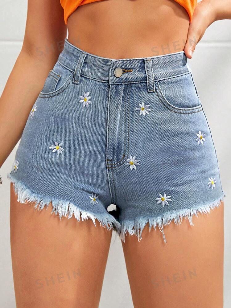 Short de jean con margaritas blancas