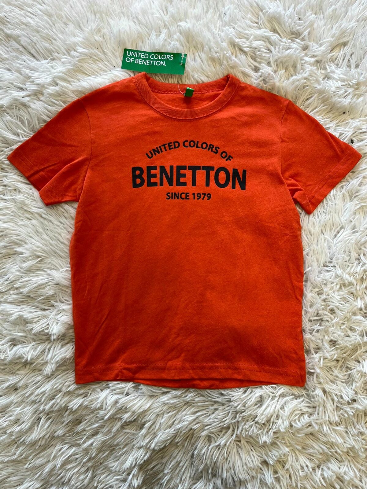 Remera united color of benetton anaranjada