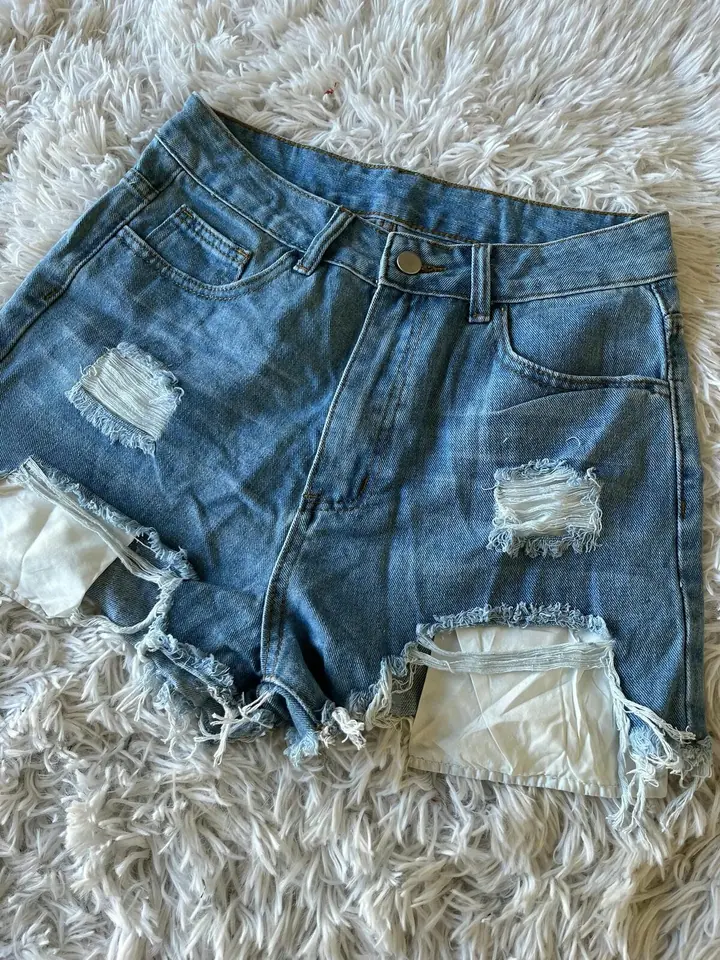 Short bolsillos afuera