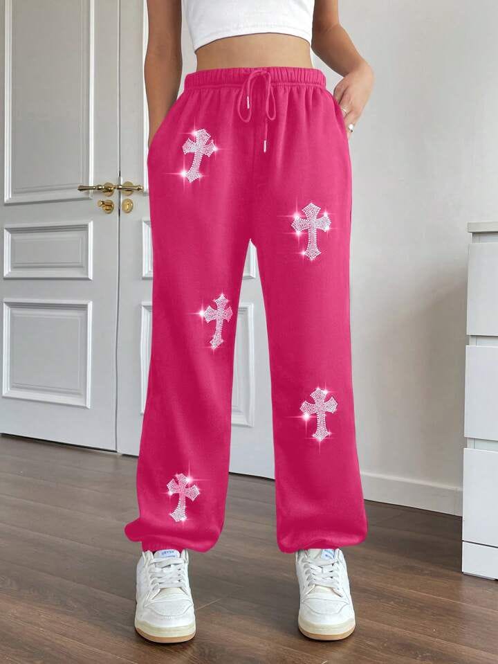 Pantalón jogger fucsia cruces de brillo