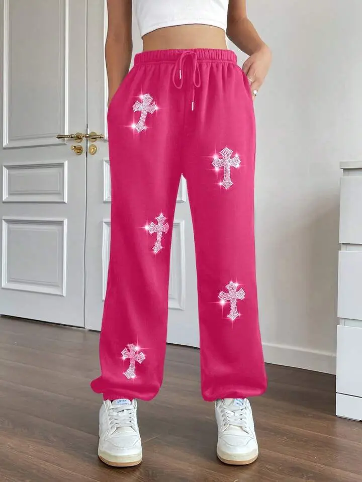 Pantalón jogger fucsia cruces de brillo