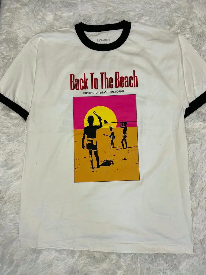 Remera blanca festival back to the beach