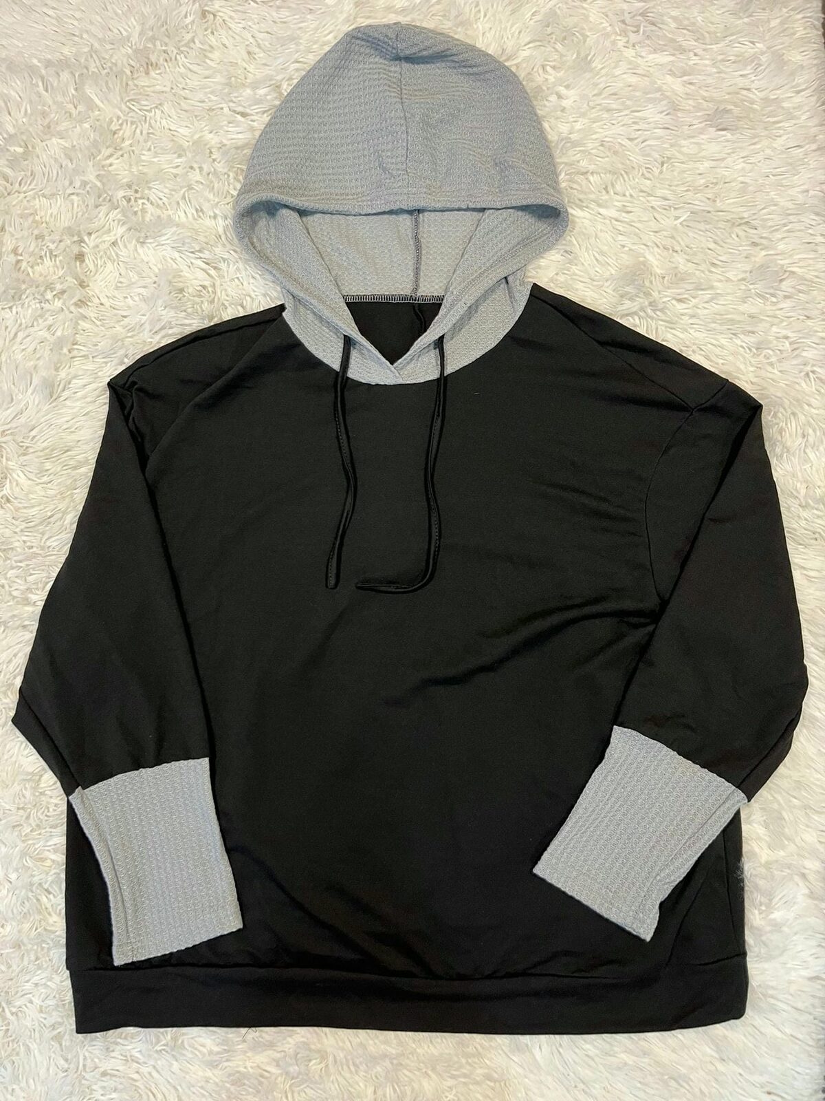 Canguro negro partes en gris waffle fino