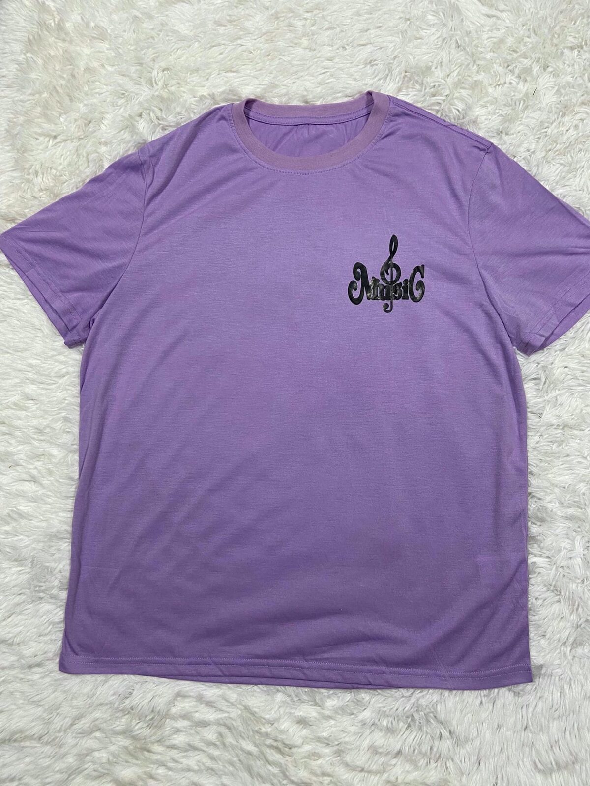Remera oversize lila music