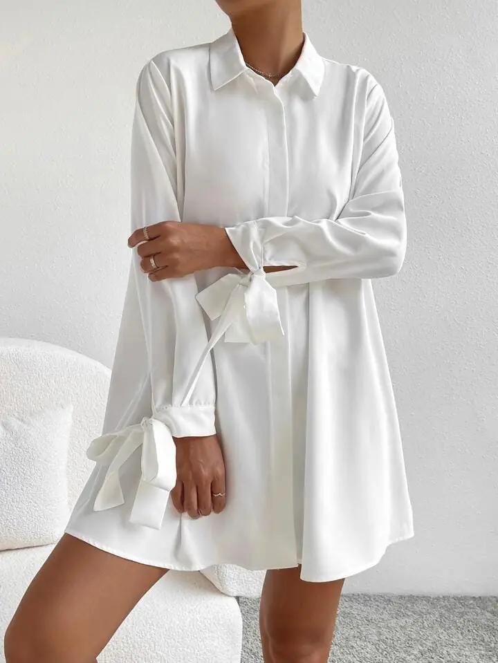 Camisa larga blanca atada en mangas