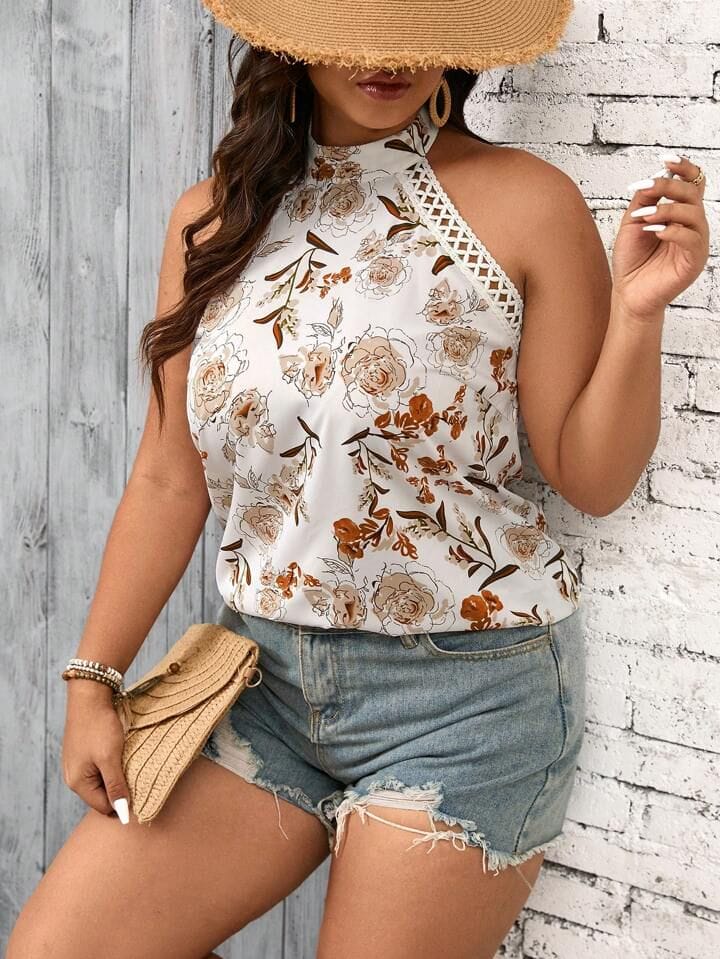 Musculosa floreada espalda abierta cuello alto