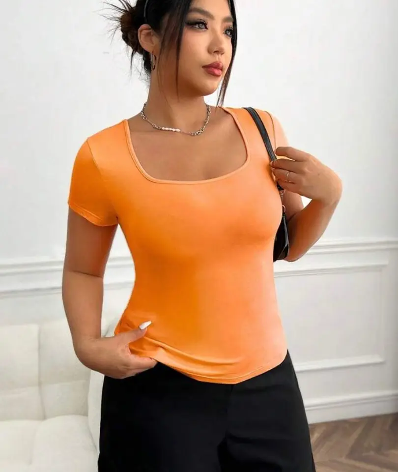 Remera al cuerpo naranja