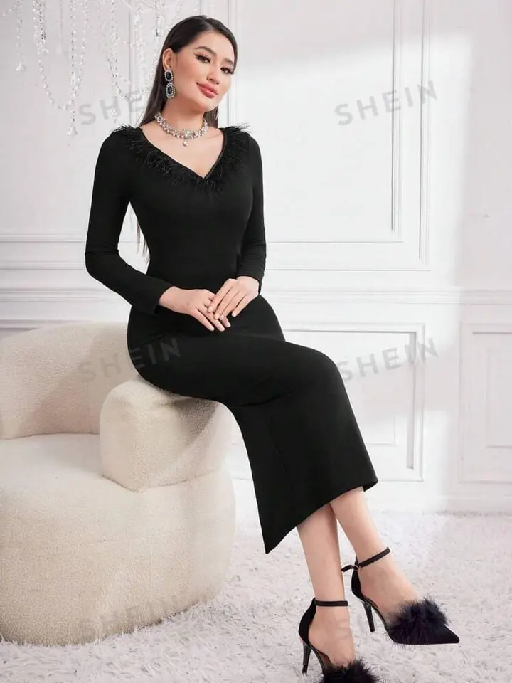 Vestido negro largo al cuerpo con pelo en escote