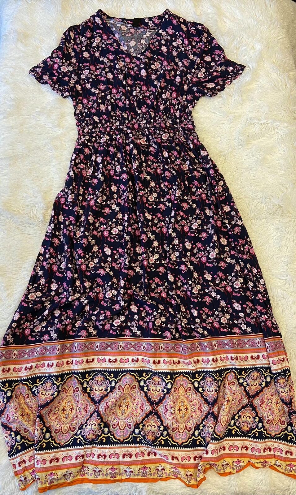 Vestido floreado detalles naranjas