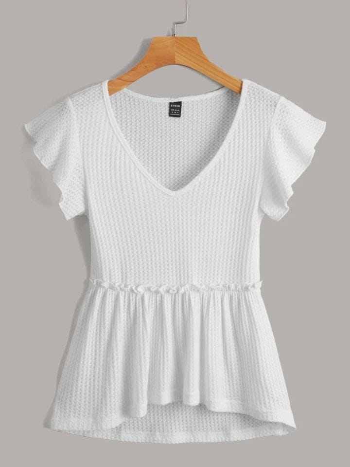 Remera blanca volado