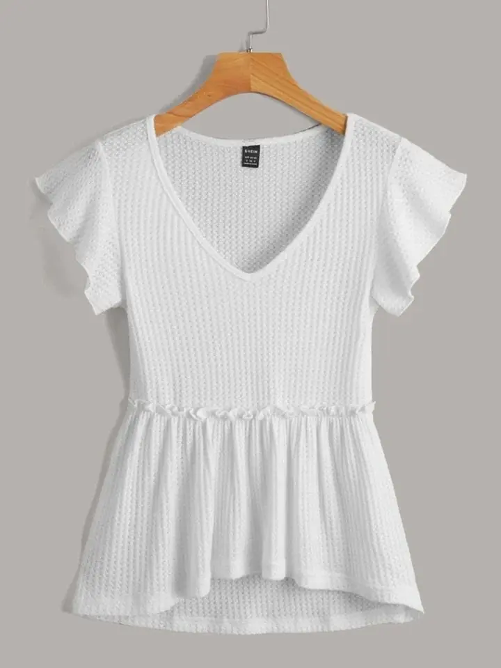 Remera blanca volado