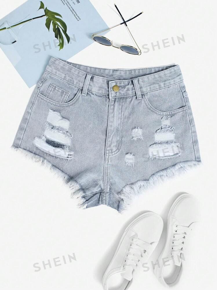 Short gris celeste claro con roturas desflecado