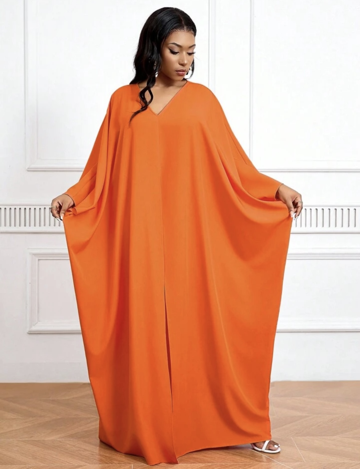 Vestido largo anaranjado apertura en el medio, no incluye pantalón
