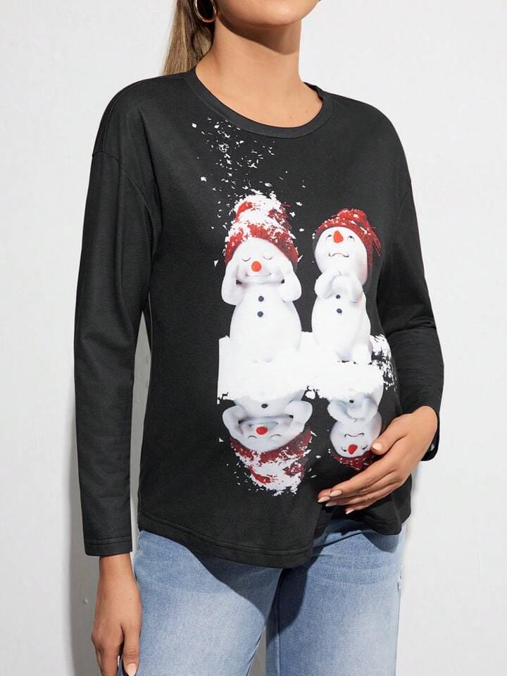 Remera negra con muñecos de nieve