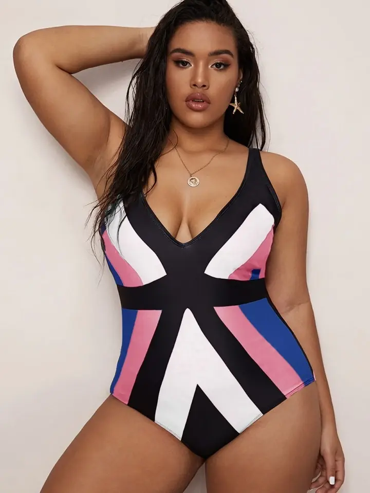 Enteriza negra,blanca,rosa y azul