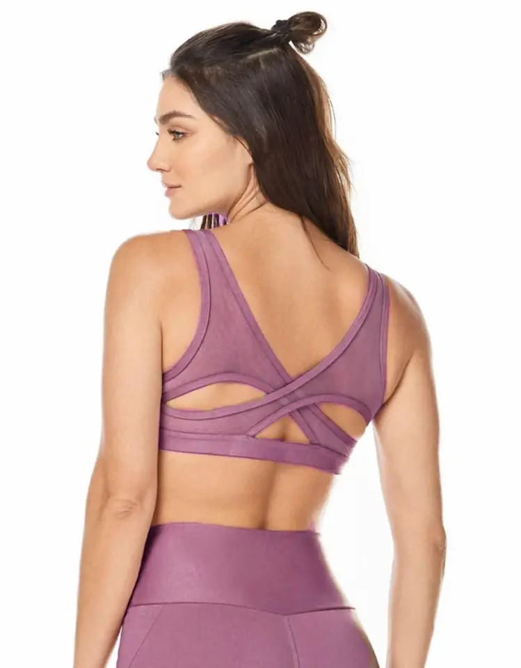 Top deportivo violeta claro cruzado con transparencia atras