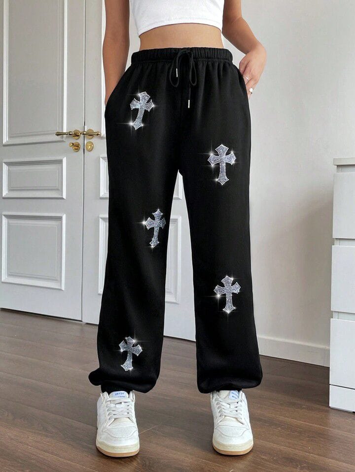 Pantalón jogger negro cruces en brillos