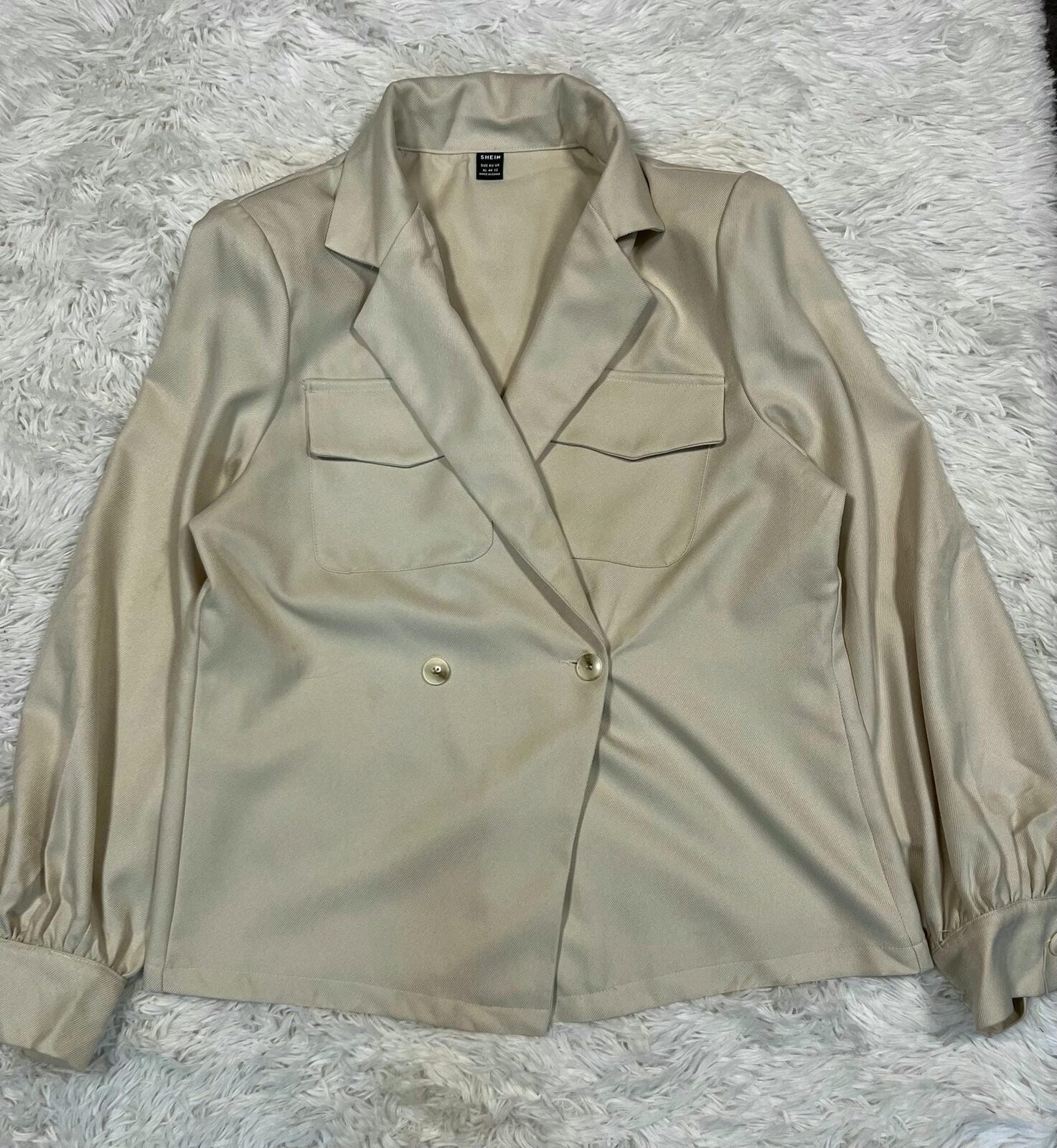 Blazer beige dos botones dorados