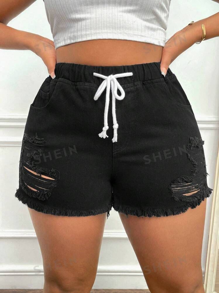 Short negro con roturas y cordón