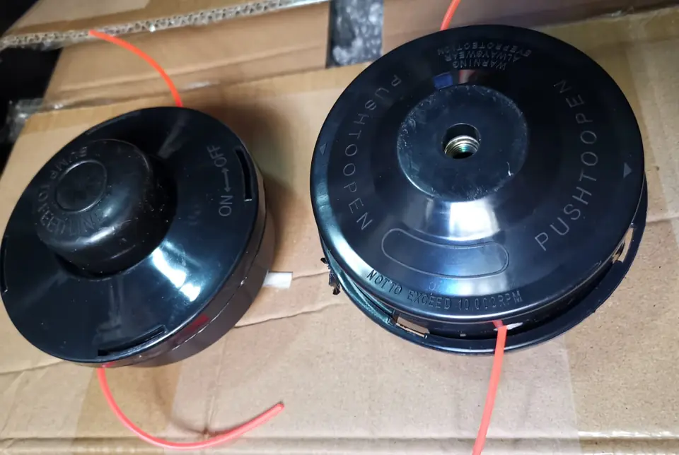 CARRETEL CABEZAL PARA DESMALEZADORA NEGRO OJAL METAL (U200)